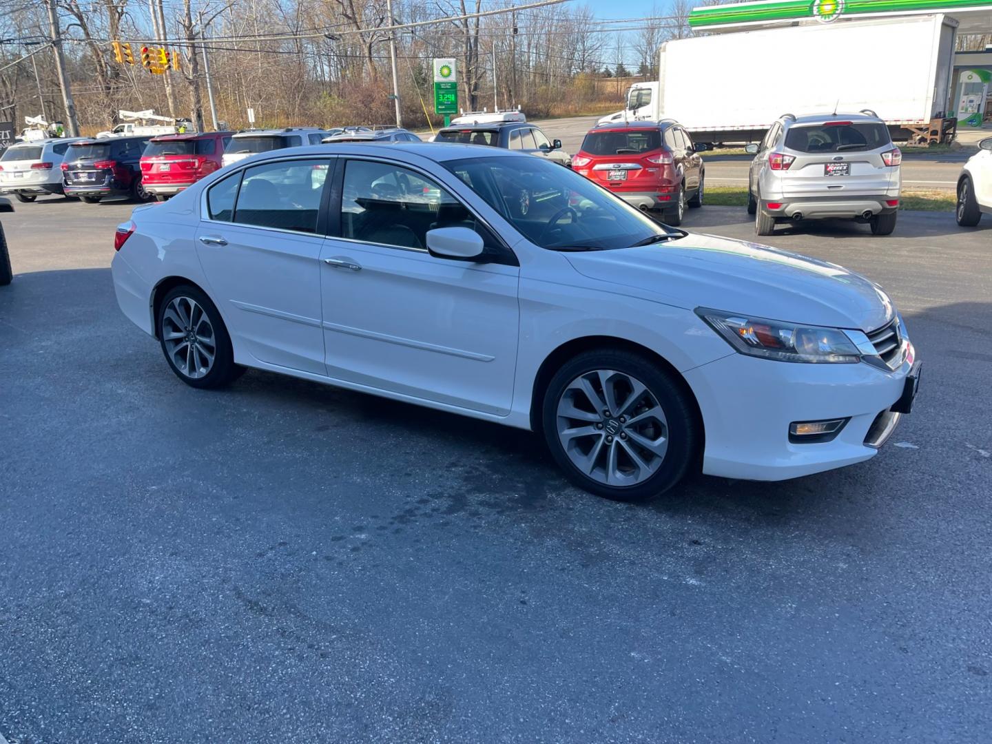 2013 White /Black Honda Accord Sport (1HGCR2F50DA) with an 2.4L I4 DOHC 16V engine, Automatic transmission, located at 547 E. Main St., Orwell, OH, 44076, (440) 437-5893, 41.535435, -80.847855 - This 2013 Honda Accord Sport CVT is a reliable and fuel-efficient sedan. It is powered by a 2.4-liter four-cylinder engine that produces 189 horsepower. The CVT (continuously variable transmission) provides smooth and efficient acceleration. The Accord Sport CVT comes equipped with features such as - Photo#3